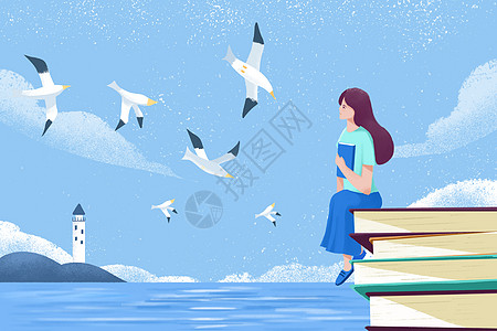读书日学生青年在海边坐在书上图片
