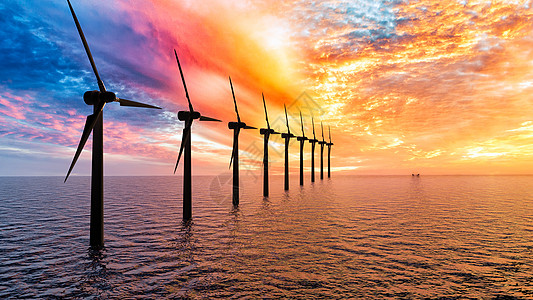 大海夕阳创意风力发电场景设计图片