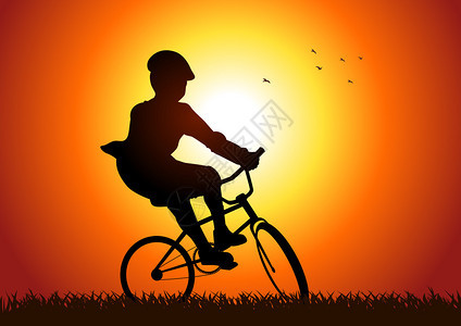 一张男孩骑自行车的图片