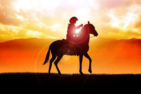 日出时骑马的牛仔剪影插图图片