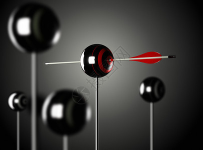一个红色箭头刺穿杆上的球形目标图片