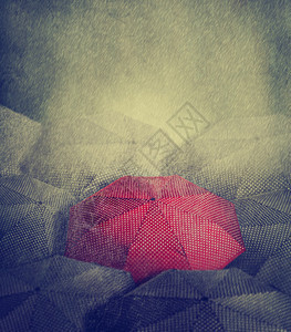 从人群中脱颖而出的红伞的艺术形象图片