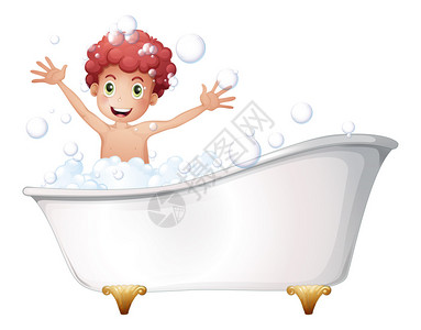 说明浴缸里有个小男孩玩着白图片
