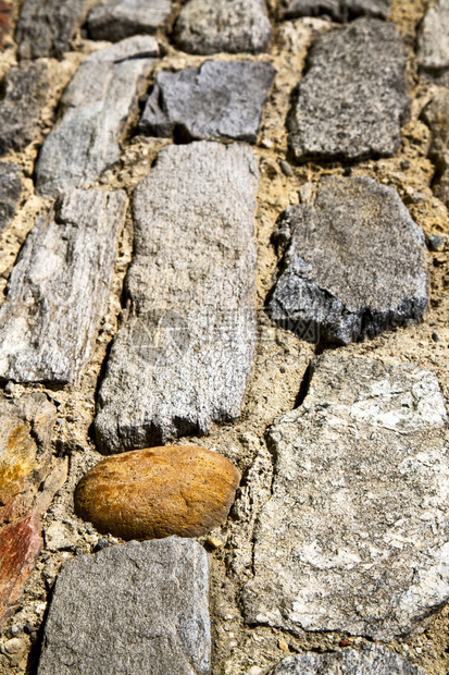 砖在阿尔萨戈塞普里奥街伦巴第意大利瓦雷泽抽象路面的curc图片