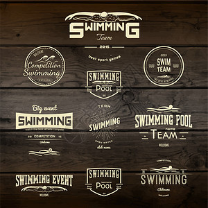 任何用途的游泳徽章标志和标签在木图片