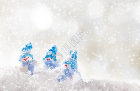 圣诞背景与雪人和飘落的雪花图片