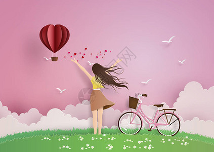 美丽的女孩用纸心热气球在天空上伸展双臂纸笔艺术和手工艺风格图片