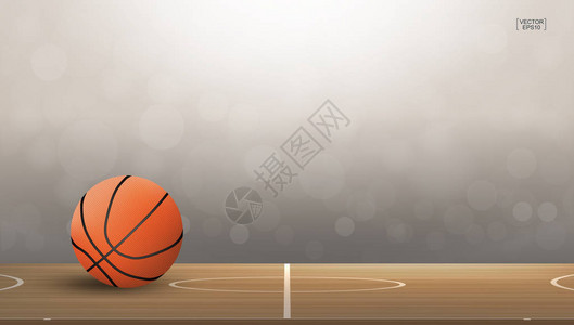 篮球场区域的篮球与光模糊散景背具有灯光效果的篮球运动的抽象背景图片