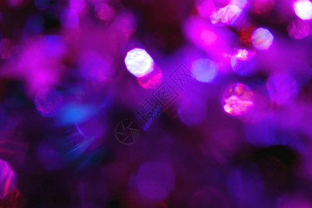 抽象的泥土紫色闪光照亮了灯光图片