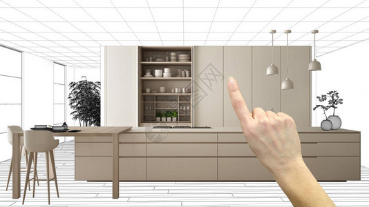 手指向真正的现代白色厨房图片