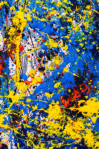 抽象表现主义当代艺术使用滴水技术绘制的图片混合不同的颜色红黄蓝白黑色彩缤纷线条和斑图片