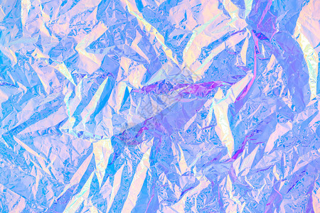 80年代风格的模糊抽象现代柔和彩色全息背景皱巴的彩虹箔真实纹理合成波蒸汽波风格Retrowave图片