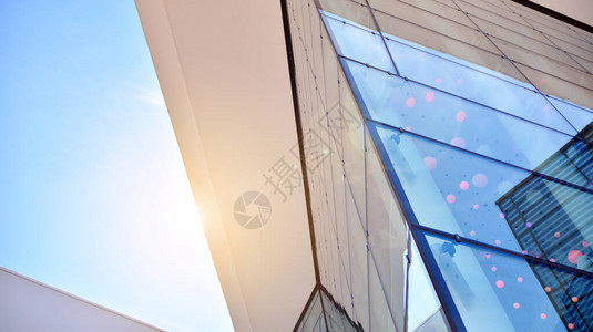 商业建筑关闭蓝色玻璃现代建筑的抽象质感商业背景有阳图片