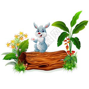 在树干上的卡通兔子背景图片