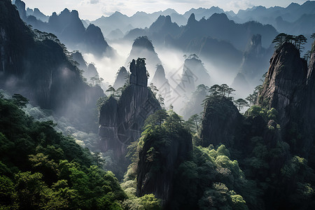 中国山水山峰云雾环绕群山雾绕瀑布背景图片