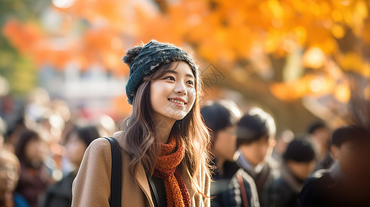 美丽女士正在享受秋天气氛图片