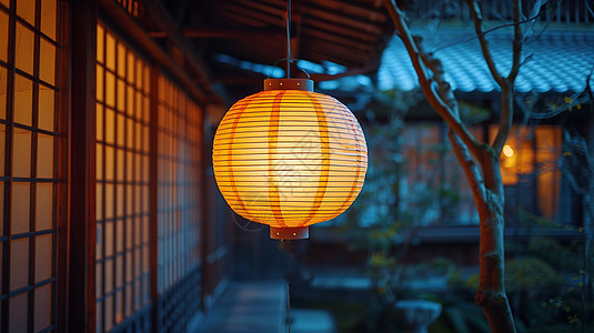 夜晚窗外一盏点亮的橙红色卡通灯笼背景图片