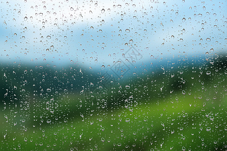 窗外雨滴背景图片