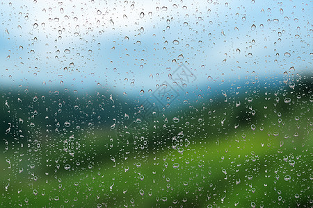窗外雨滴背景背景图片