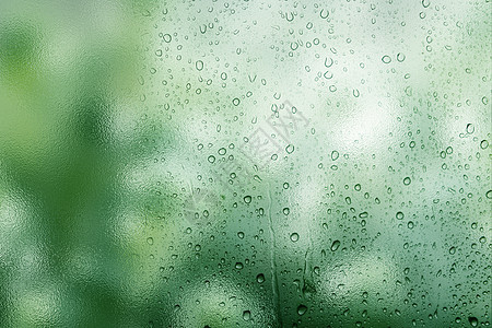 唯美绿色雨滴背景图片