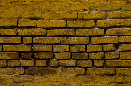 黄色的砖墙背景图片