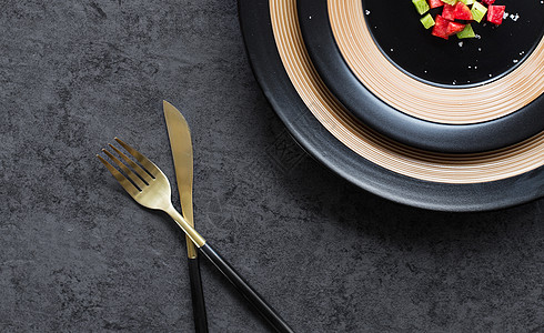 不锈钢筷子葡萄牙金色刀叉背景