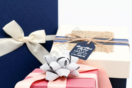 蓝色温馨带有礼花的粉色礼物盒摆拍背景