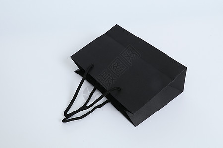 牛皮纸包装盒经典黑色购物袋牛皮纸包装背景