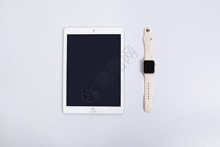 智能白色平板电脑和苹果手表背景