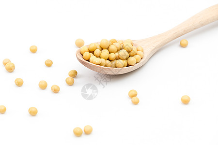 散落的黄豆和木勺高清图片