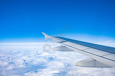 飞机蓝天飞机机舱内拍摄机翼背景