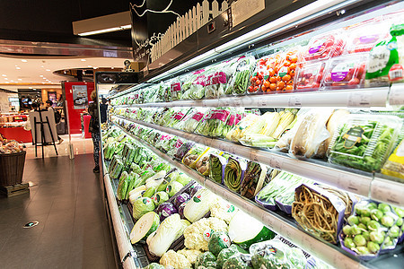 高档超市蔬菜摊位展示背景图片
