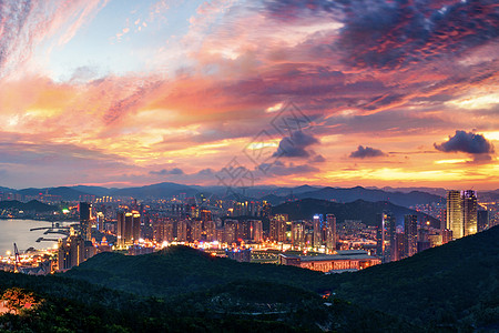 楼顶夜景变焦下的城市夜景背景