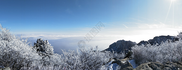 泰山山顶云绕雪山顶高清图片