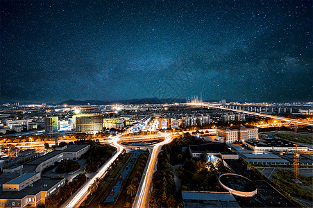公路合成星空下的城市夜景背景