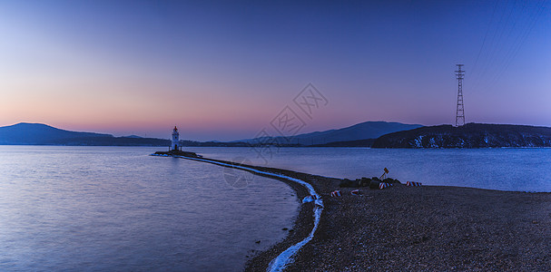 海湾灯塔日出全景图片