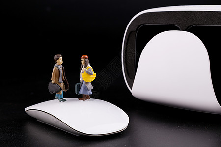 科技鼠标卡通人偶和VR设备背景