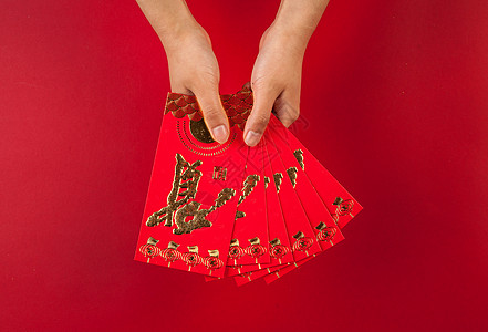 中国风手拿红包送礼祝贺背景