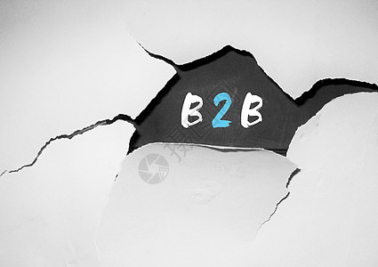 破裂墙纸里的b2b概念图图片