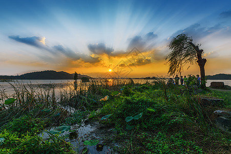 东湖日落美景背景图片