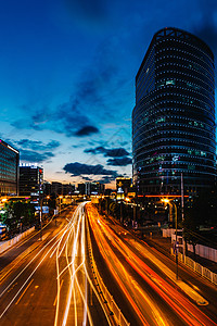 酒店全景城市车流夜景背景