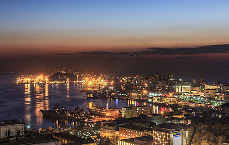 夜幕下码头海滨城市夜景背景