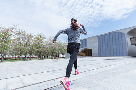 年轻伸展运动大气户外运动女孩跑步背景
