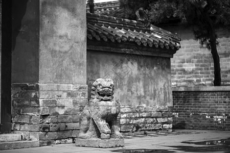 古代风格山水画门口石狮背景