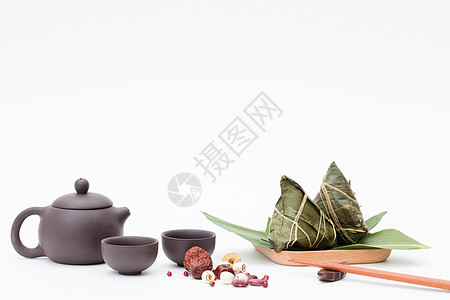 桌面绿色端午粽子茶壶静物白色桌面摄影背景