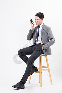 通讯行业商务男士使用手机微信打电话背景
