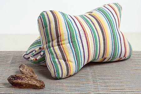 棉麻材质手工纯天然材质条纹棉麻靠枕枕头静物背景