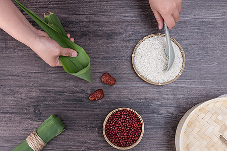 枣端午节传统手工包粽子过程背景