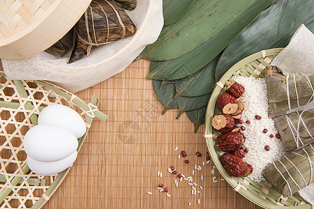 端午节竹垫上食品背景图片