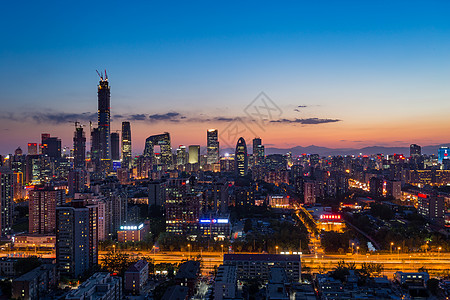 海边城市夜景北京城市风光国贸CBD夜景背景